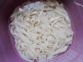 Drain the noodles and rinse them under cool water for a refreshing texture.