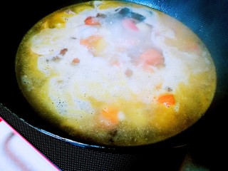 Bring to a boil over high heat and skim off any foam.