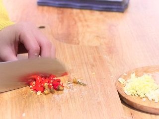 Add edamame and season with soy sauce and salt.